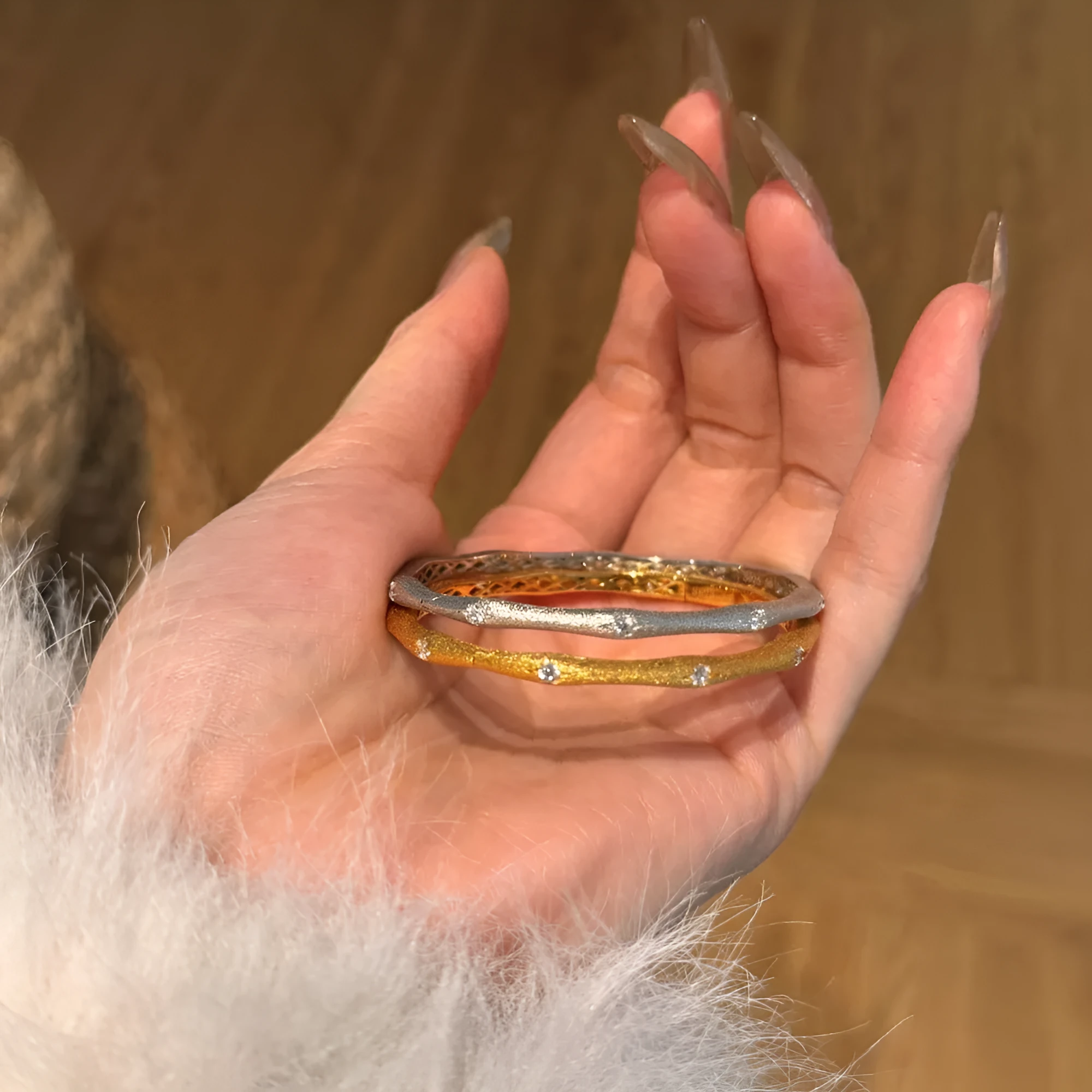 925 silver gold finish wire drawing bracelet with zircon inlay on white background