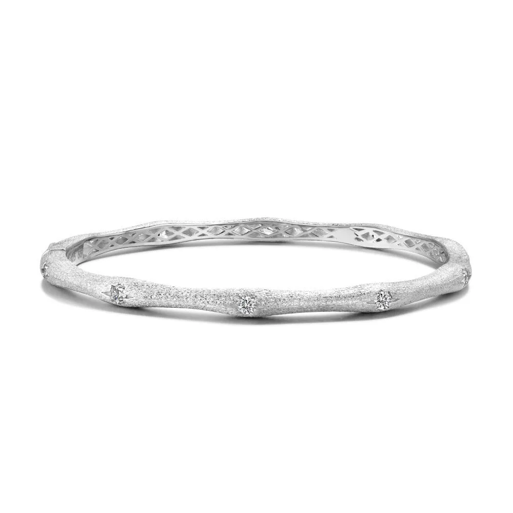 925 silver gold finish wire drawing bracelet with zircon inlay on white background