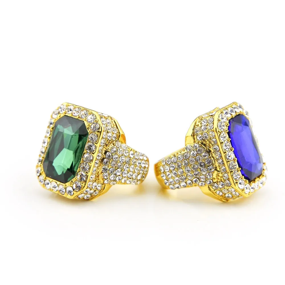 Gold-plated men's hip hop ring with emerald colour, geometric asymmetric design, and diamond treatment