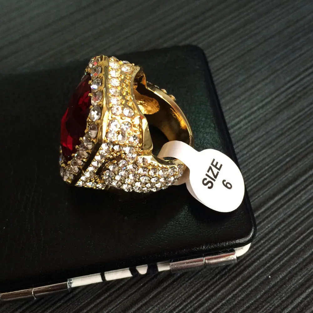 Gold-plated men's hip hop ring with emerald colour, geometric asymmetric design, and diamond treatment