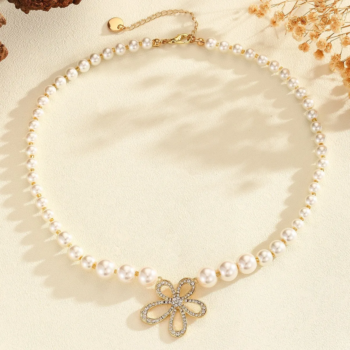 French romantic flower pendant necklace in silver tone with adjustable chain on white background