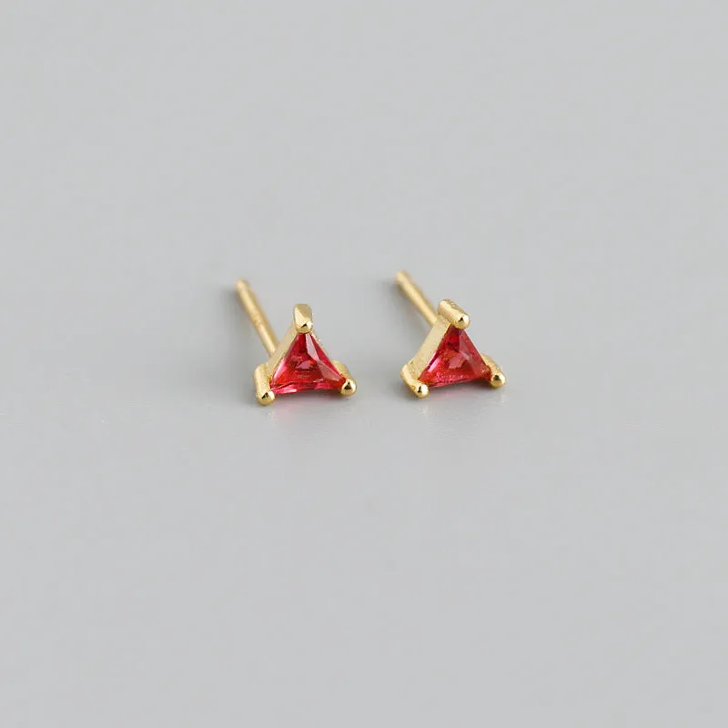 Simple triangle colour zircon stud earrings in 925 sterling silver with blue stone and gold needle on white background