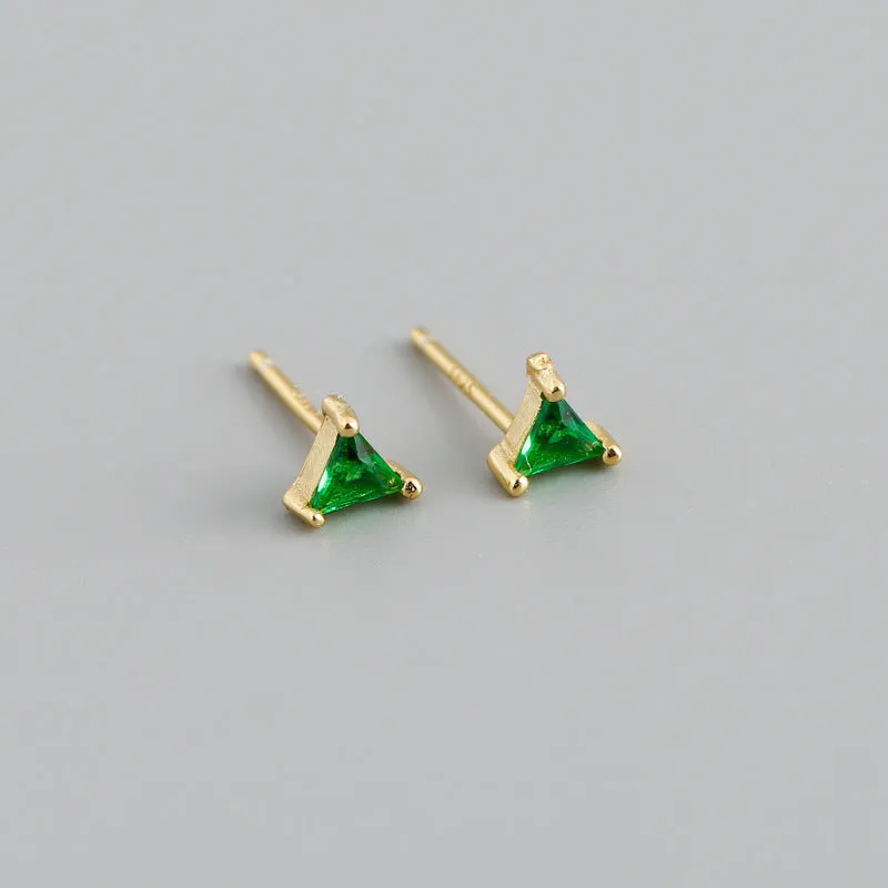 Simple triangle colour zircon stud earrings in 925 sterling silver with blue stone and gold needle on white background