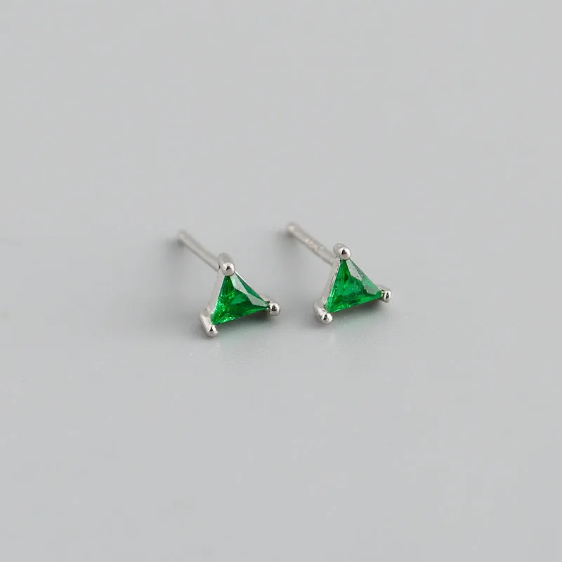 Simple triangle colour zircon stud earrings in 925 sterling silver with blue stone and gold needle on white background