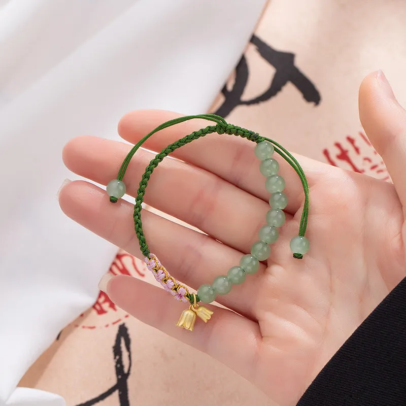 Hand woven red rope women's bracelet with Lily design and floral national style decoration