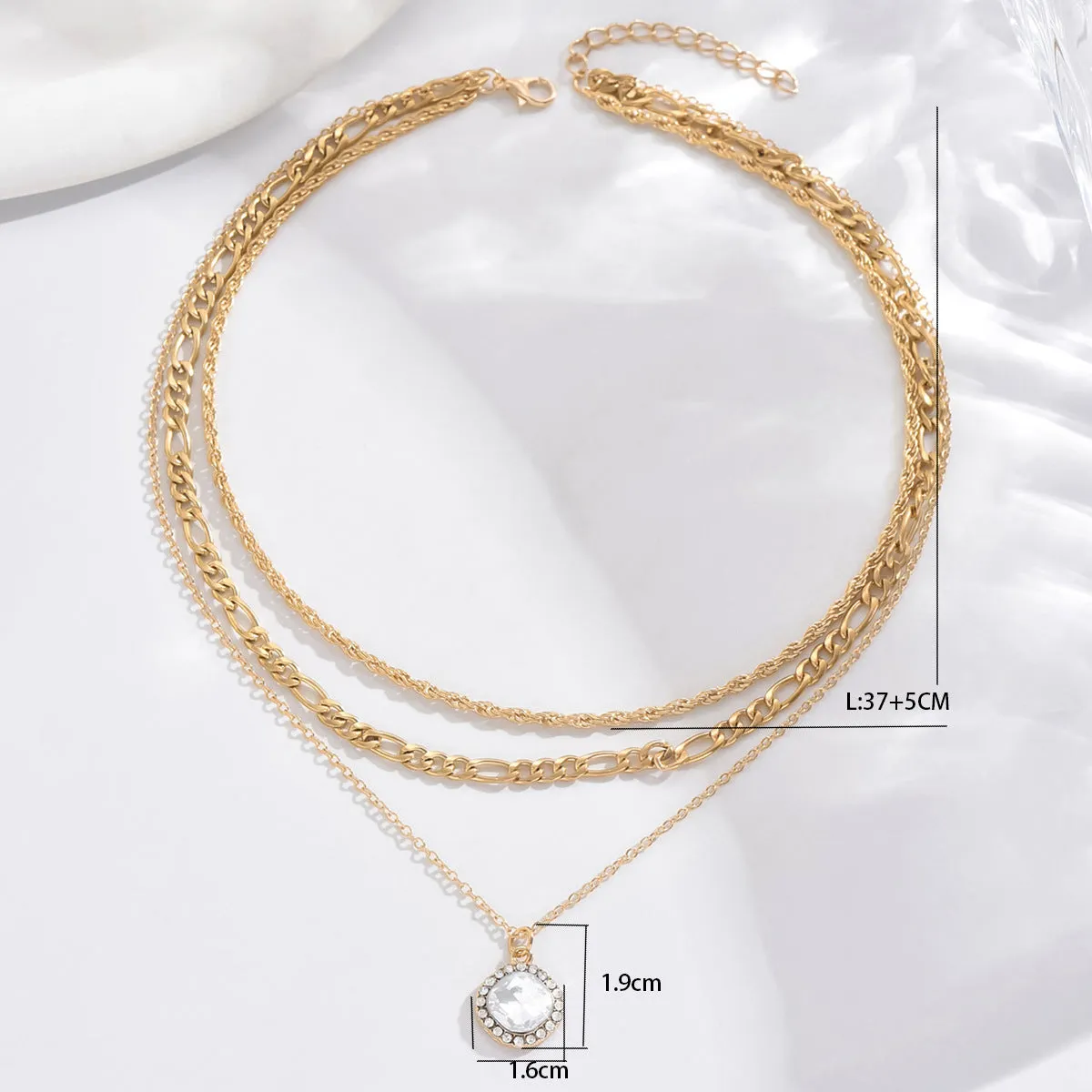 Gold multi-layer pendant necklace with large hemp flowers chain and round geometric pendants on alloy base