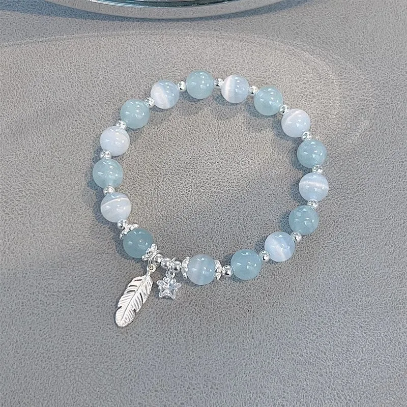 Korean style glass crystal bracelet with feather XingX blue moonlight colour and eight Awn star design