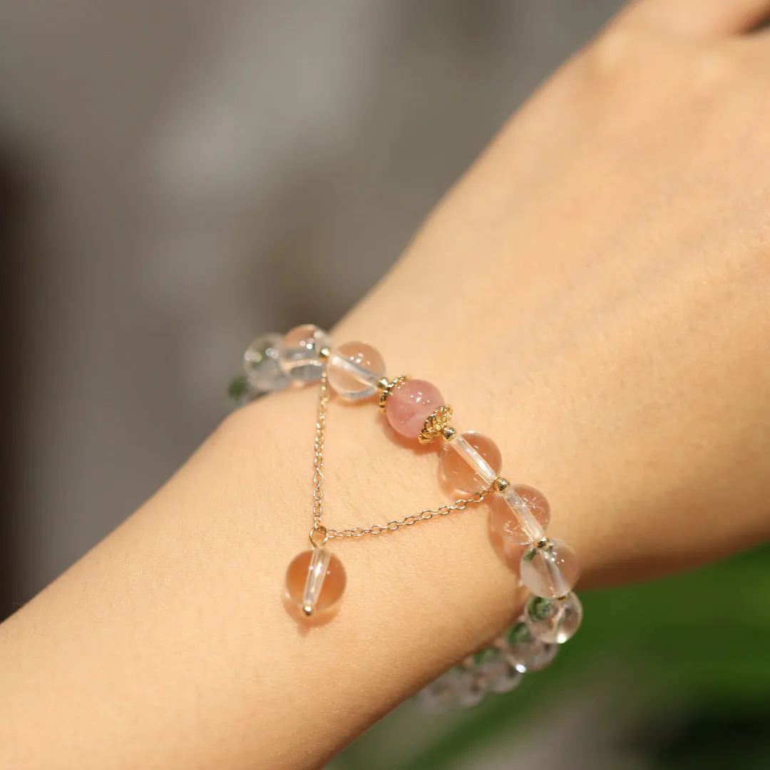 White and pink crystal bracelet with cat eye obsidian accents in Chinese geometric style