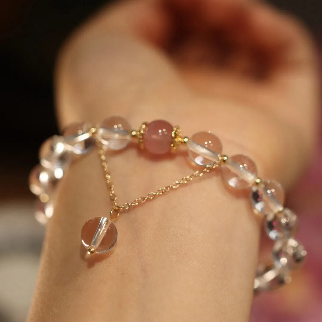 White and pink crystal bracelet with cat eye obsidian accents in Chinese geometric style
