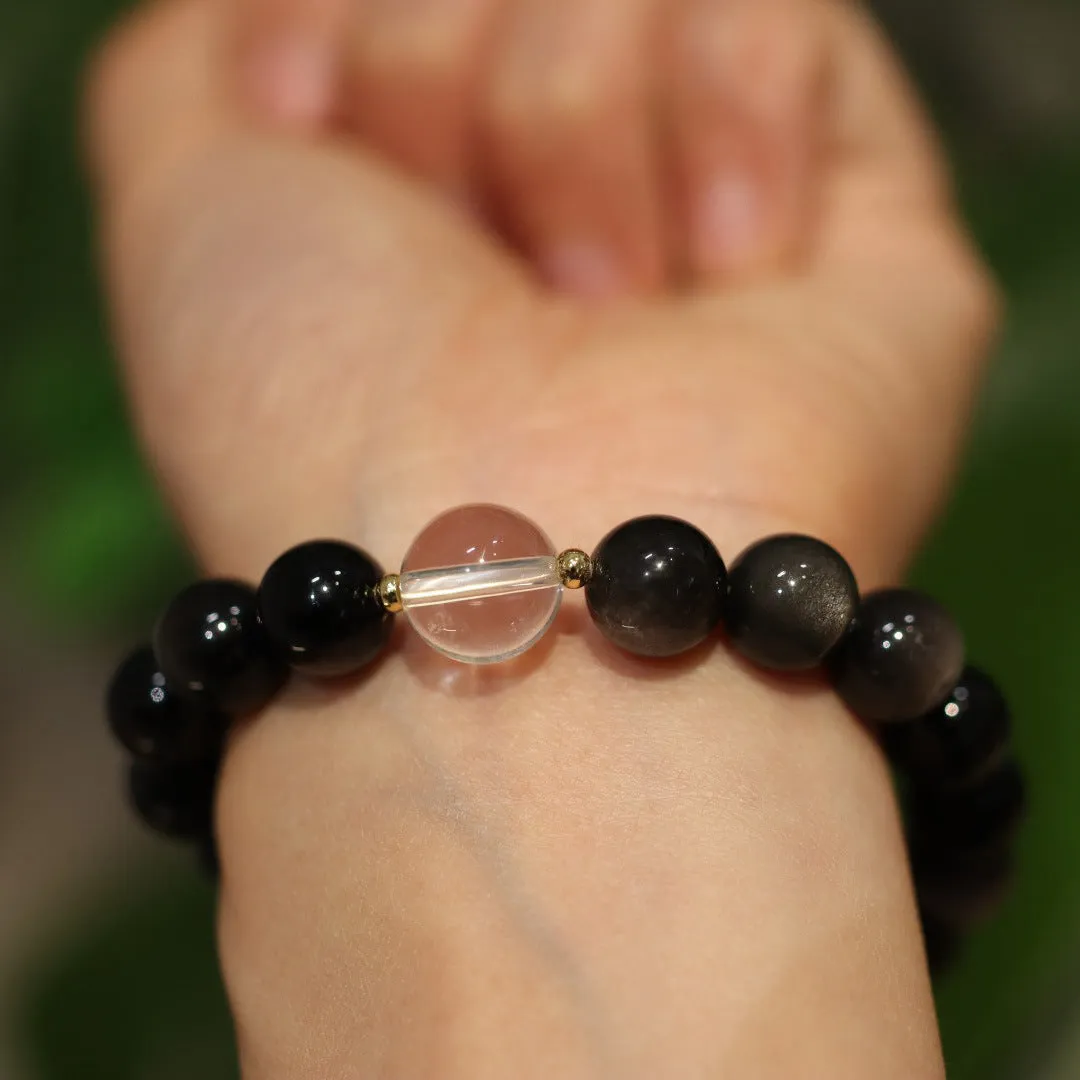 White and pink crystal bracelet with cat eye obsidian accents in Chinese geometric style
