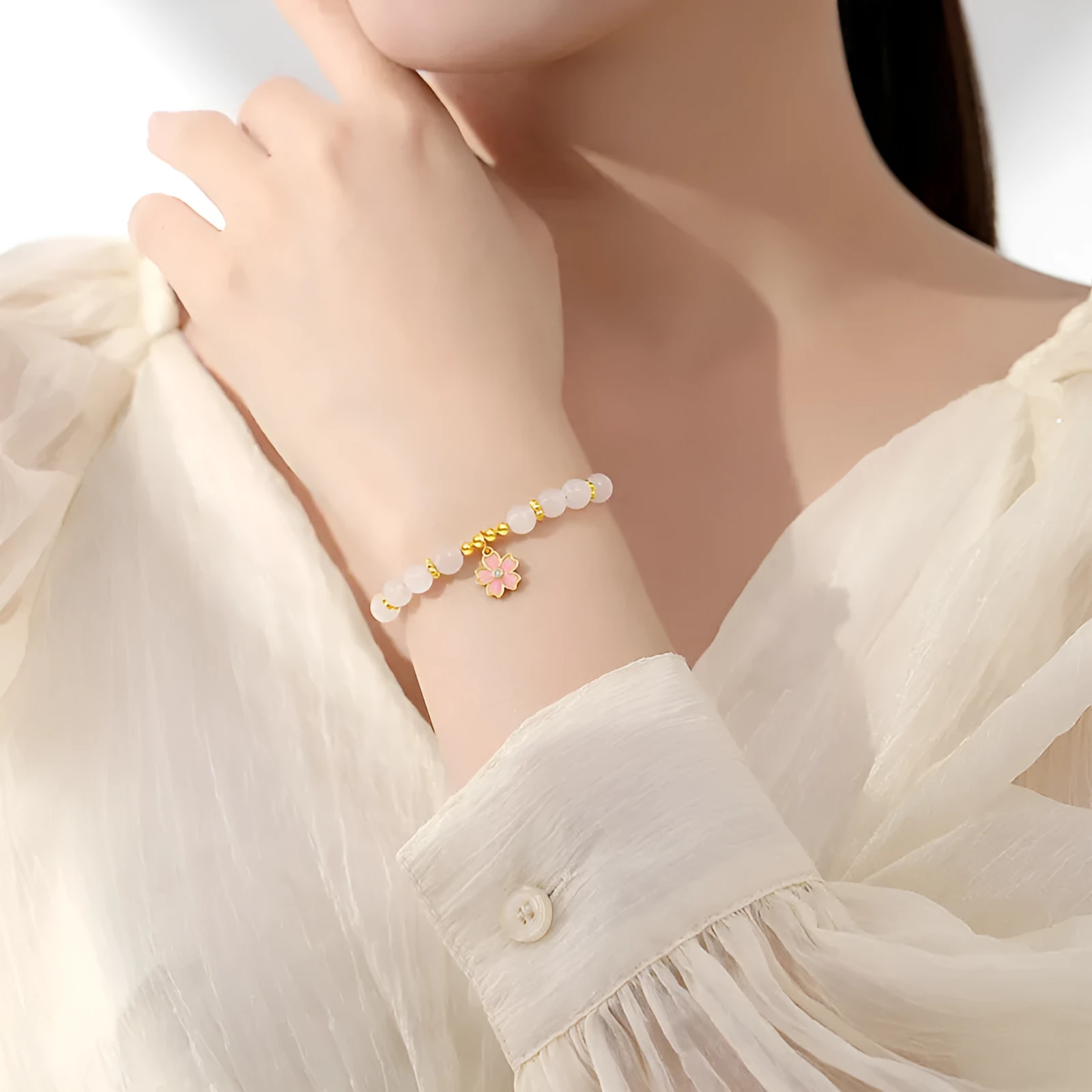Pink women's bracelet with 925 silver cherry blossom pendant, Hetian jade beads, and gradient epoxy details.