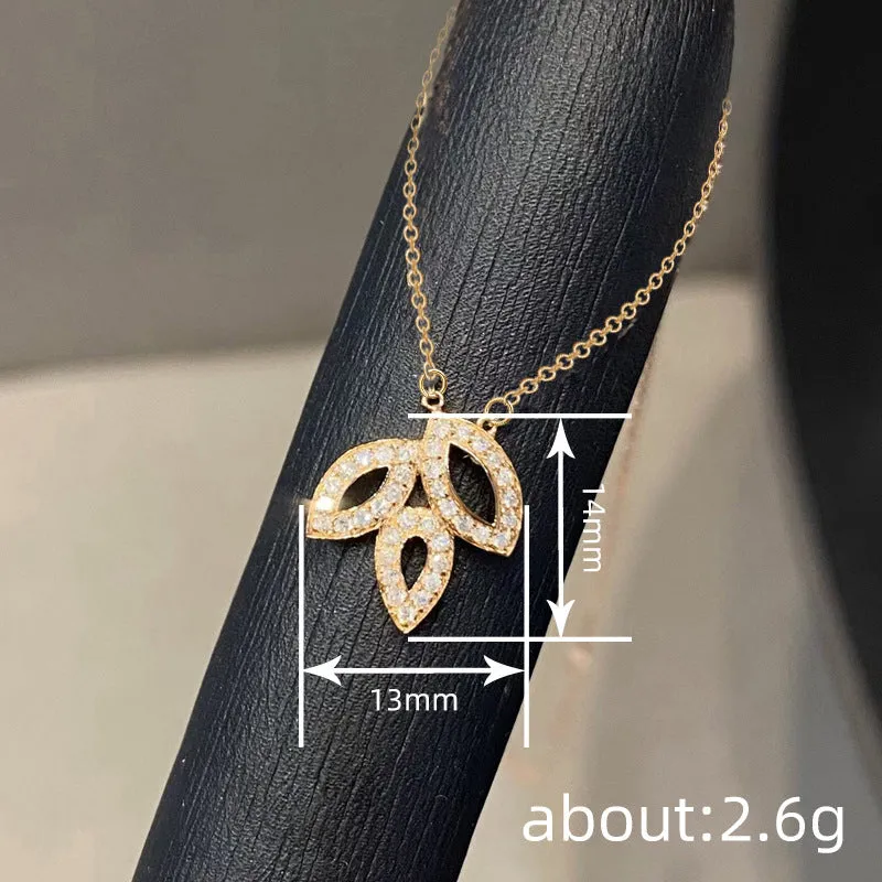 Women's yellow gold hollow leaf necklace with inlaid zircon and adjustable O-ring copper chain