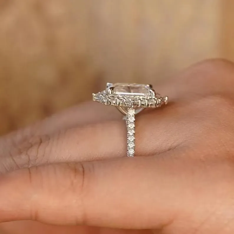 Rectangular copper ring with electroplated white gold finish on display