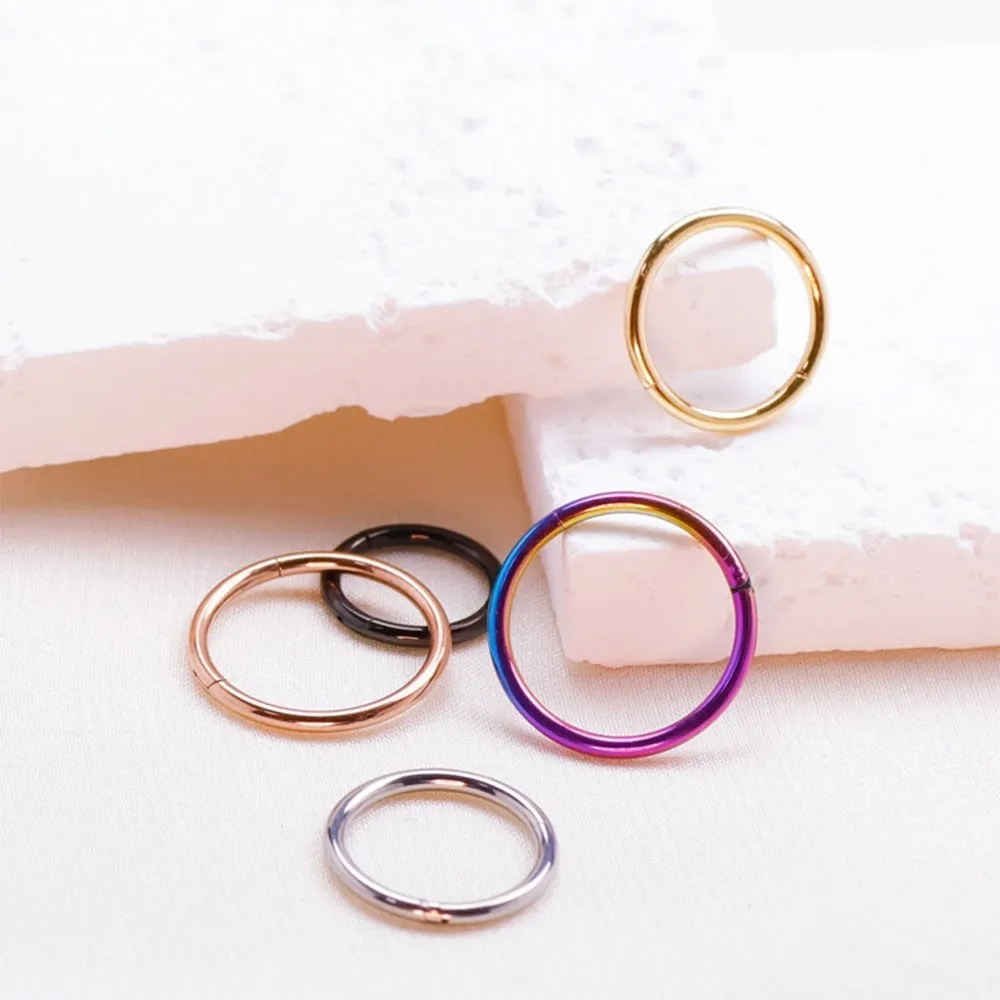 Implanted titanium alloy seamless round nose ring with inlaid zircon stone, 1.2x12mm, Diamond Gold colour