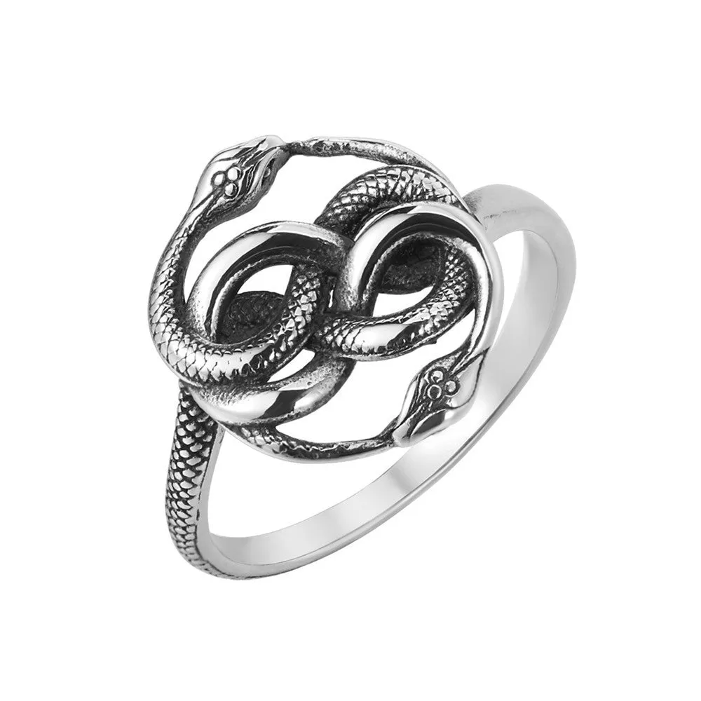 Close-up of a titanium steel double snake ring with a retro design on a hand, showing the intricate intertwined serpent detail.