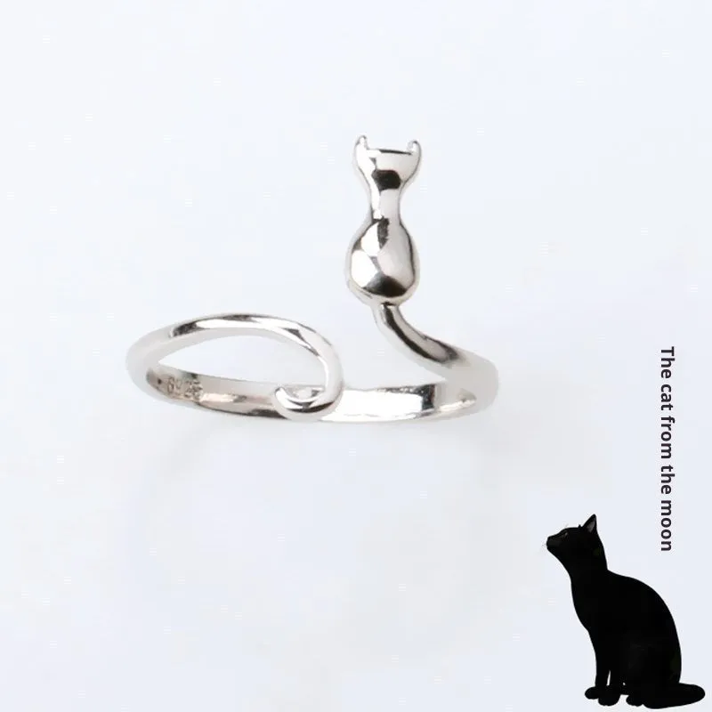 Platinum colour alloy cat face open ring with adjustable opening on white background