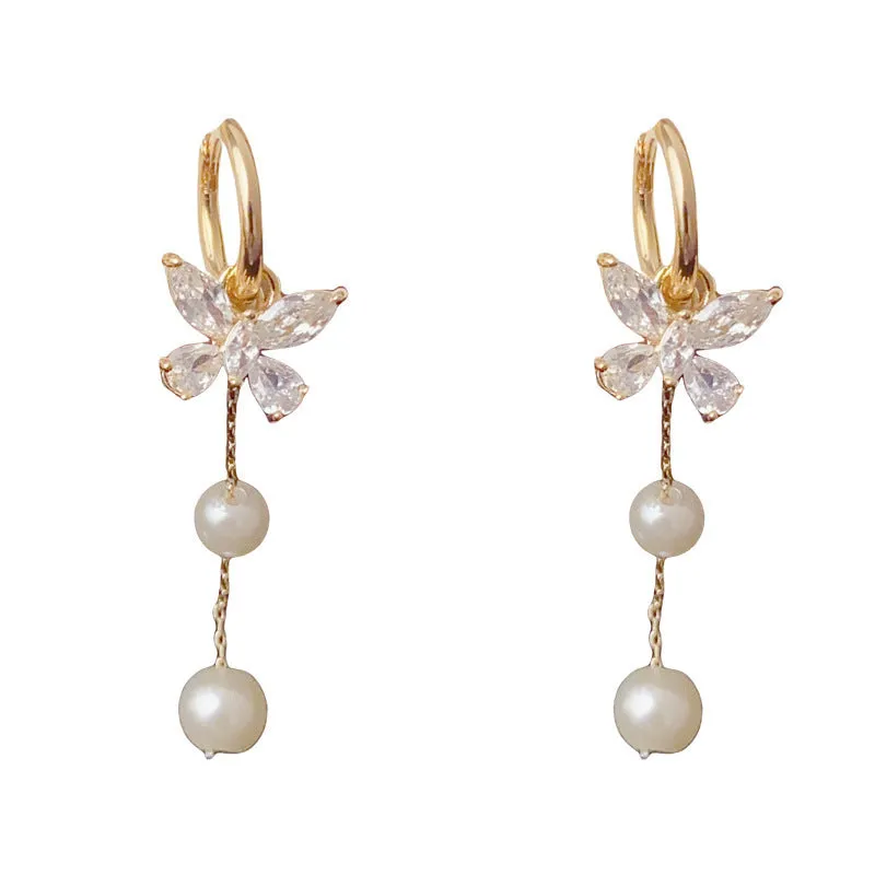 One pair of gold plated copper ear clips with butterfly pearl tassel design, clip-on style for women
