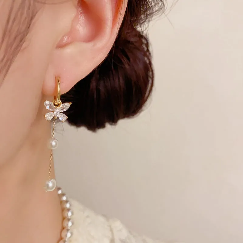 One pair of gold plated copper ear clips with butterfly pearl tassel design, clip-on style for women