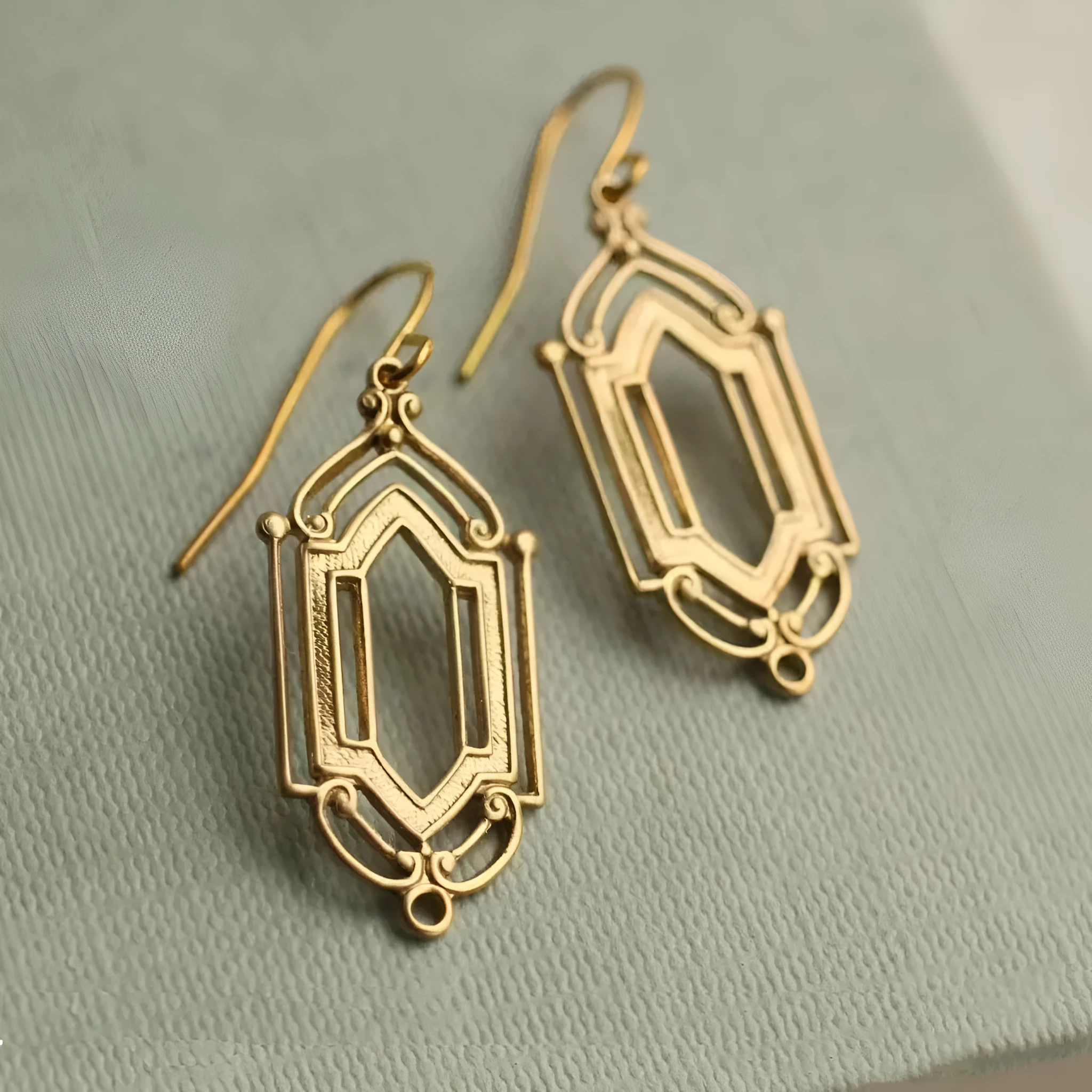 Gold flower window hollow stud earrings on copper base with geometric shape