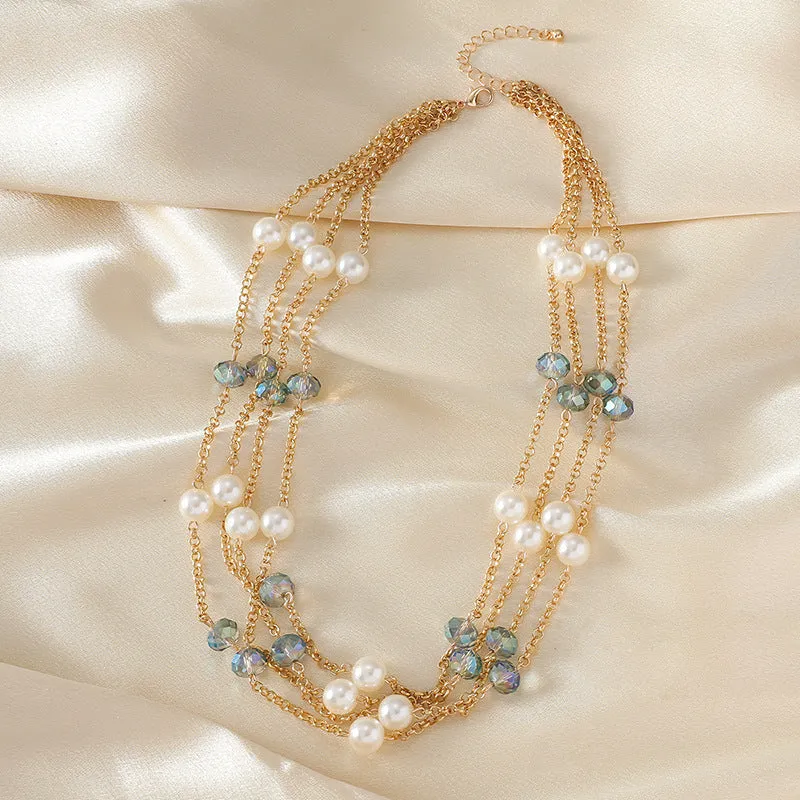 Women's sweater necklace with pearl crystal chain and round geometric alloy pendant in multiple colour options