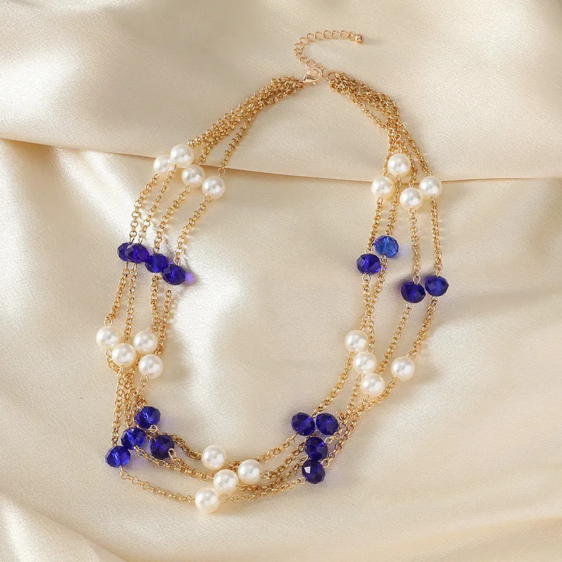 Women's sweater necklace with pearl crystal chain and round geometric alloy pendant in multiple colour options