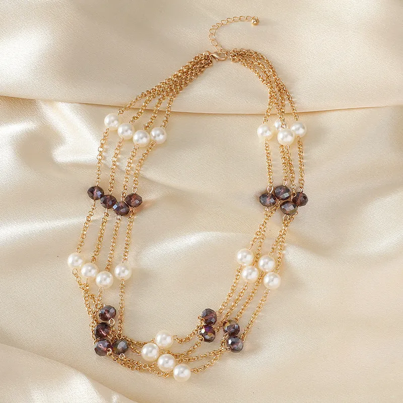 Women's sweater necklace with pearl crystal chain and round geometric alloy pendant in multiple colour options