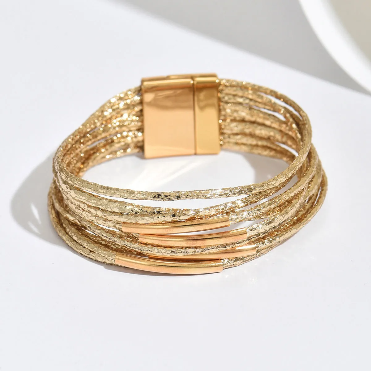 Multi-layer vintage leather bracelet with magnetic clasp, round alloy charms, in black colour