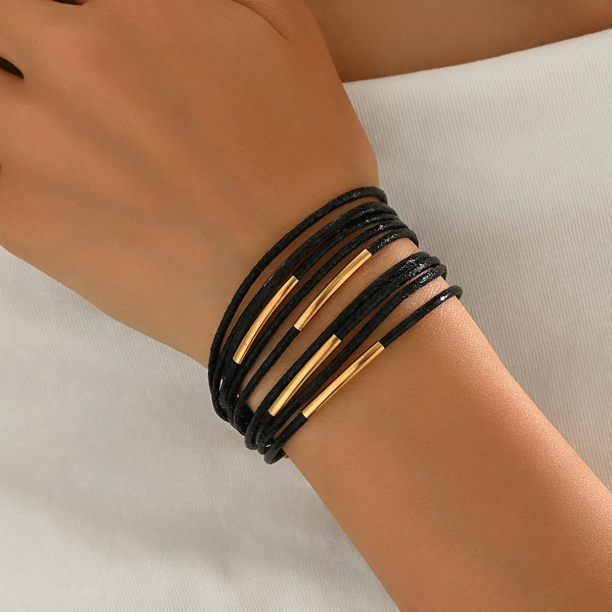 Multi-layer vintage leather bracelet with magnetic clasp, round alloy charms, in black colour