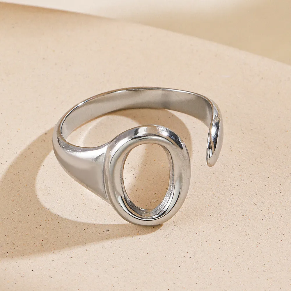 Oval ins style adjustable stainless steel ring in gold and steel colours on white background