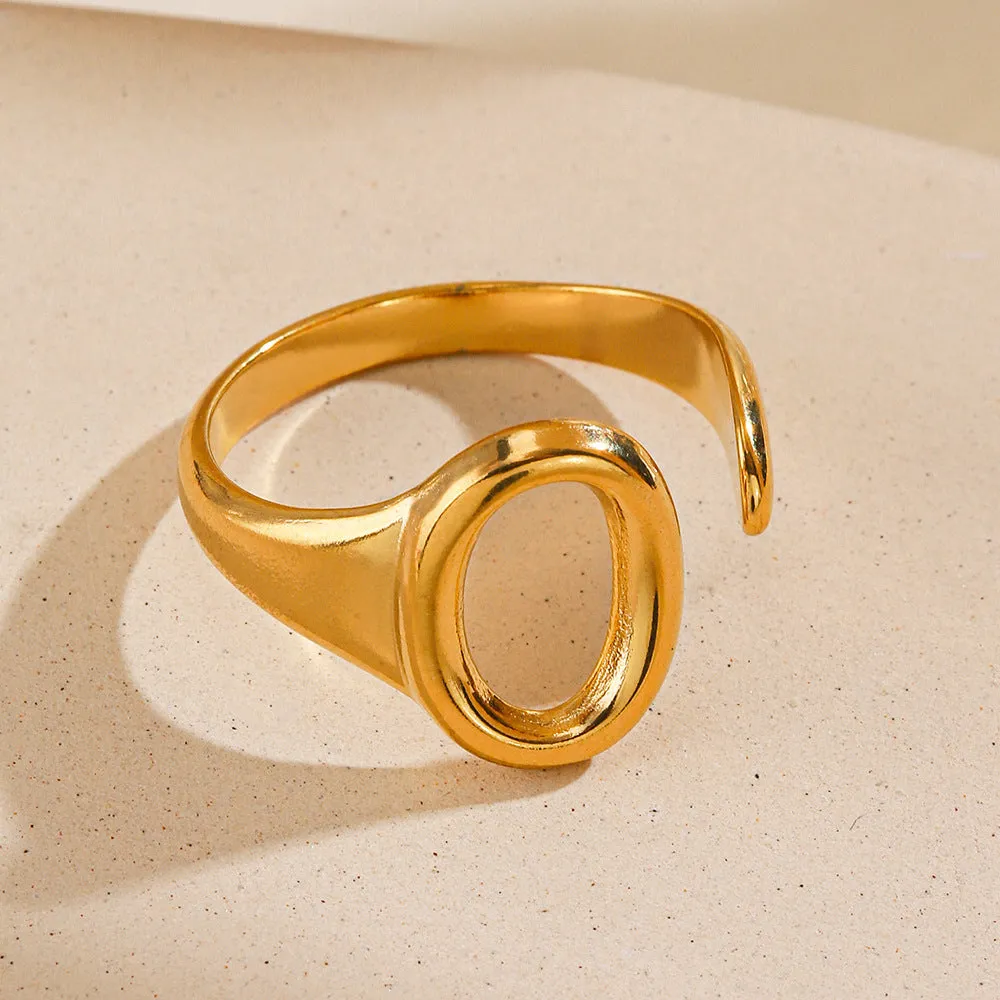 Oval ins style adjustable stainless steel ring in gold and steel colours on white background