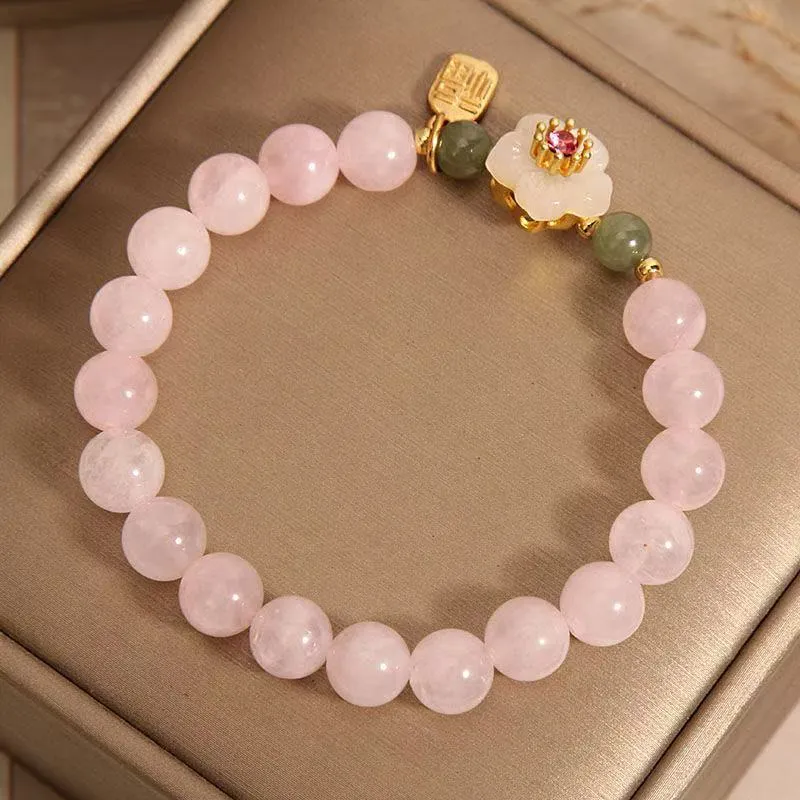Crystal Hetian jade beaded peach blossom bracelet with camellia motifs and fruit charms in blessing card colour