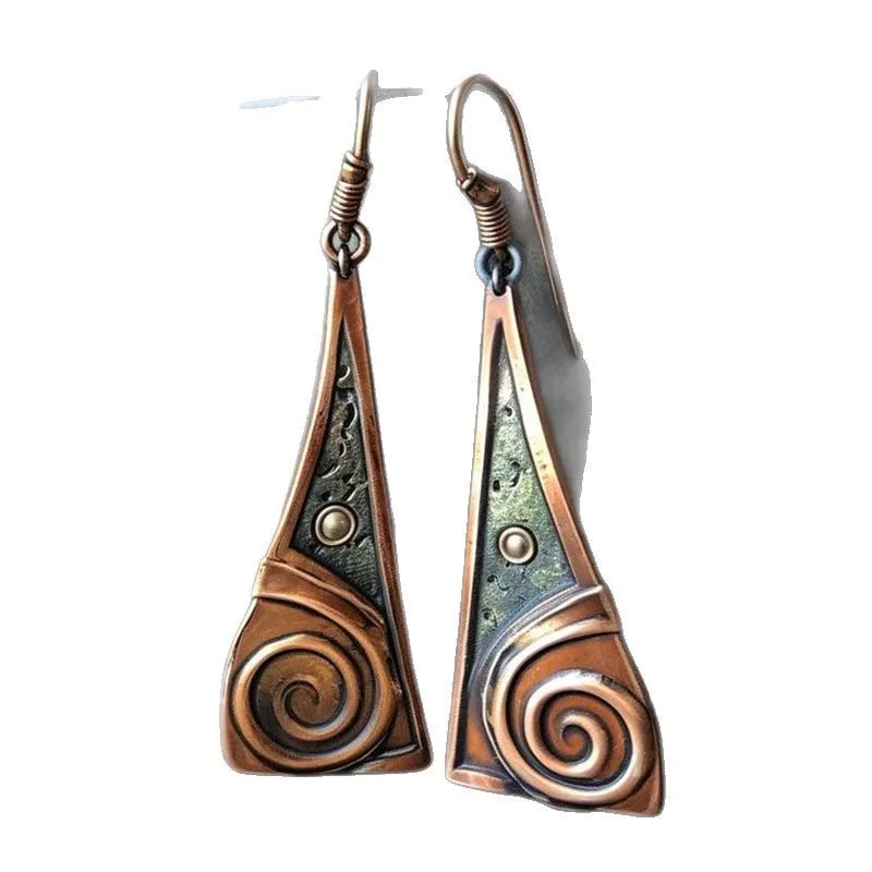 Bronze alloy geometric spiral earrings with irregular shape on a neutral background
