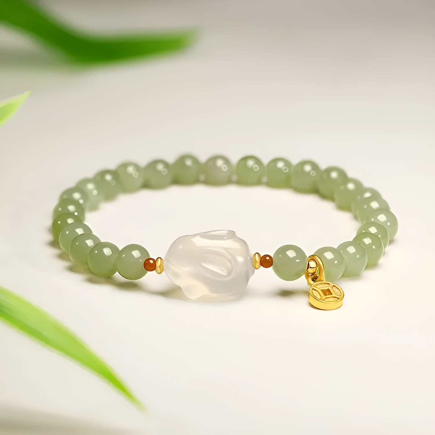 Handmade glass rabbit charm bracelet for women with coloured glaze details