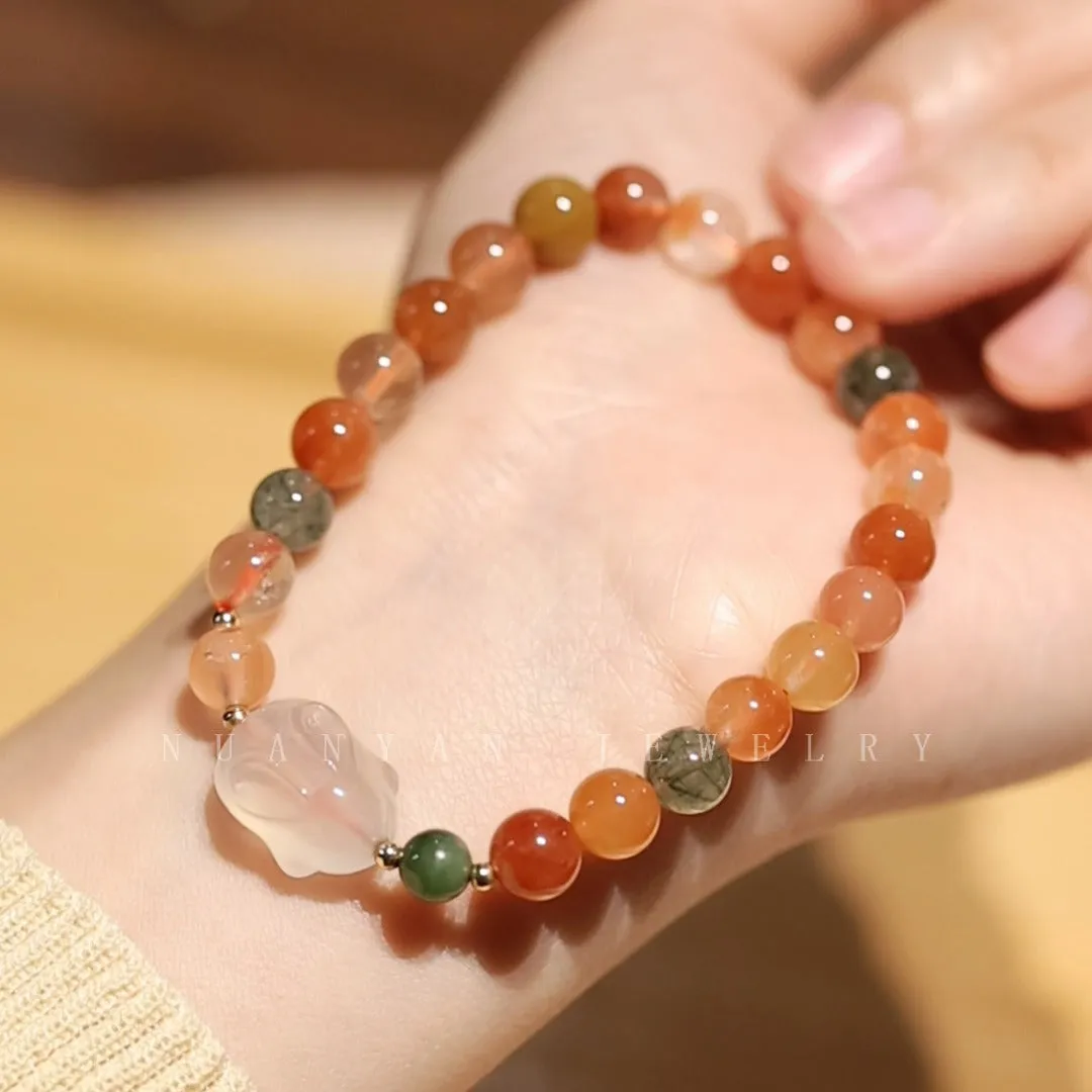 Handmade glass rabbit charm bracelet for women with coloured glaze details