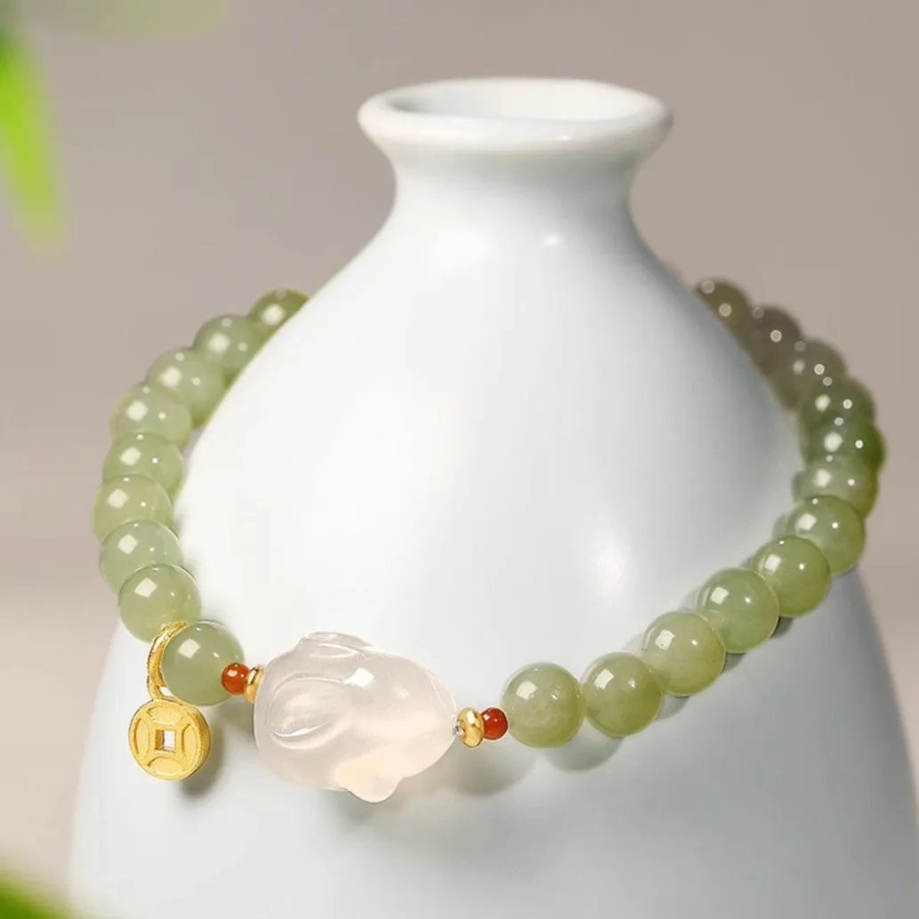 Handmade glass rabbit charm bracelet for women with coloured glaze details