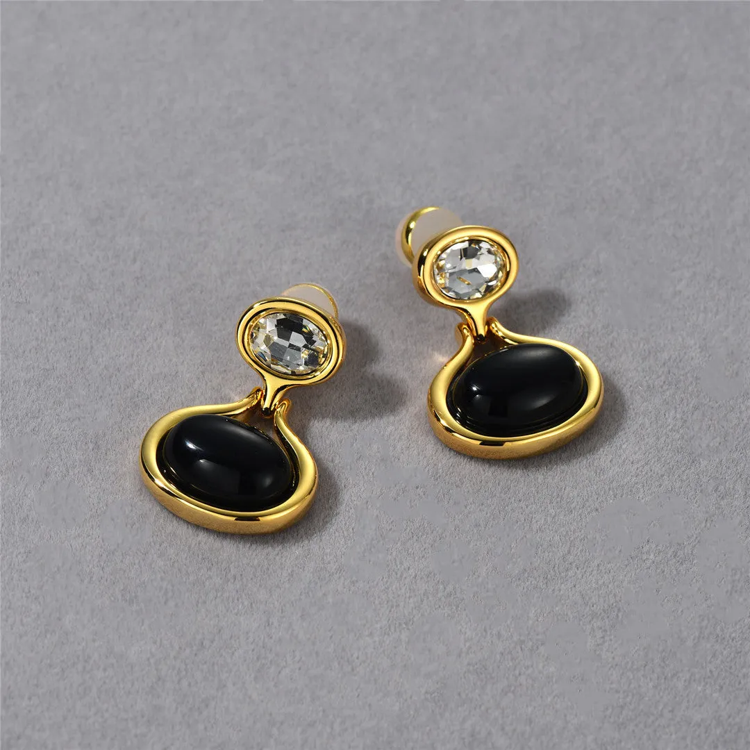 18k gold-plated brass earrings with black onyx and diamond accents, geometric shape, 28mm by 18.5mm, gold colour