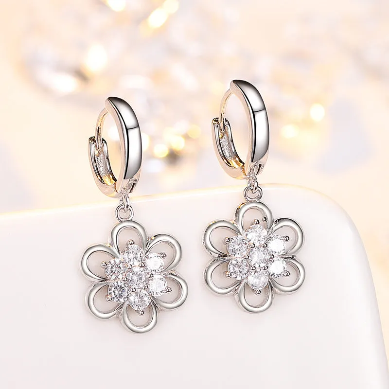 Floral white copper earrings with faceted stone accent, available as ear stud or ear hook in purple or white colour options