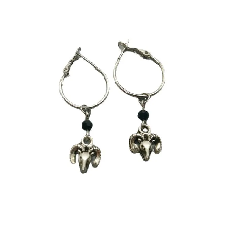 Silver round ring earrings for women with Tibetan antelope style design.
