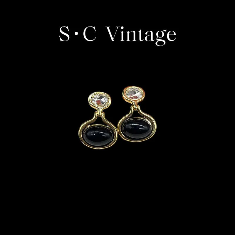 Black and gold geometric round oval alloy earrings with electroplated finish
