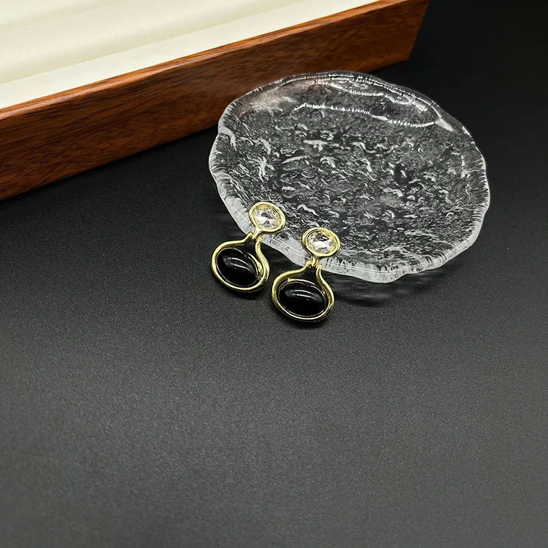 Black and gold geometric round oval alloy earrings with electroplated finish