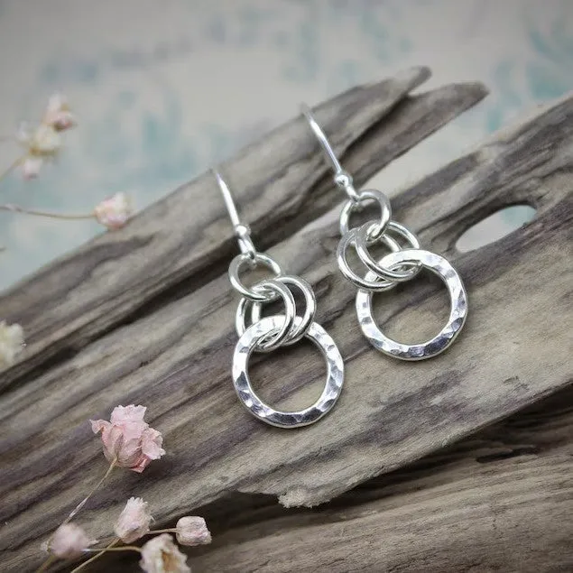 Silver retro minimalist round ring earrings on a woman