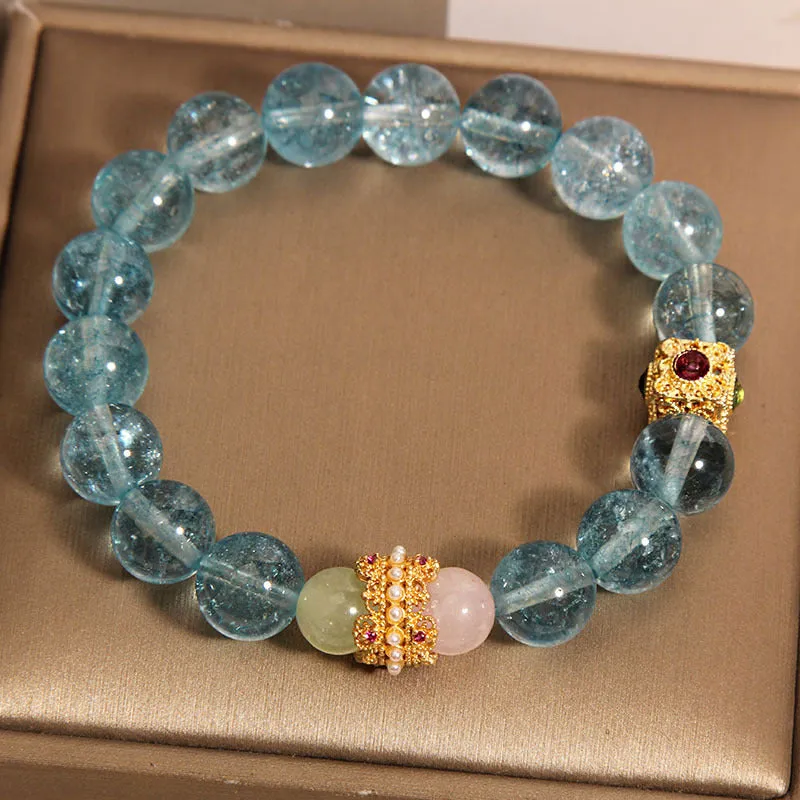Blue crystal bracelet with Chinese style design and cube sugar colourful crystals on flexible ring