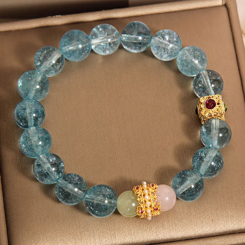 Blue crystal bracelet with Chinese style design and cube sugar colourful crystals on flexible ring