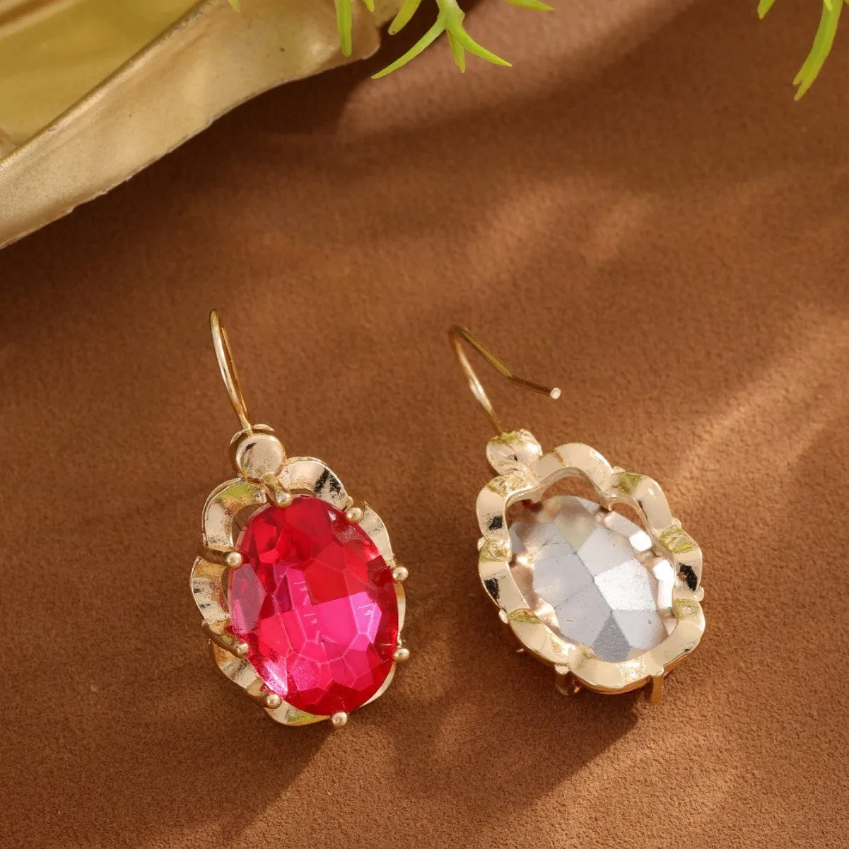 Pair of diamond studded earrings in polished zinc alloy, available in light blue, rose red, and royal blue colours
