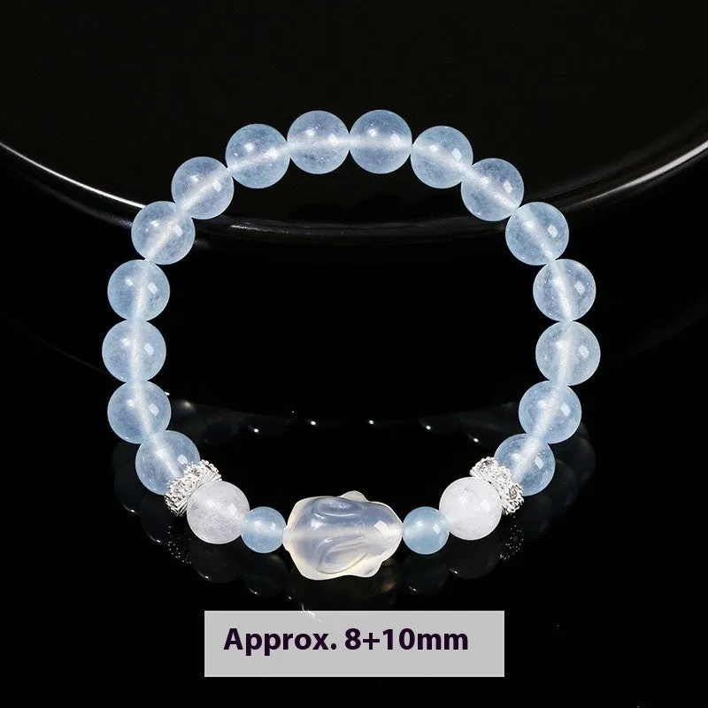 Women's natural crystal charm bracelet with handcrafted details and various gemstone options