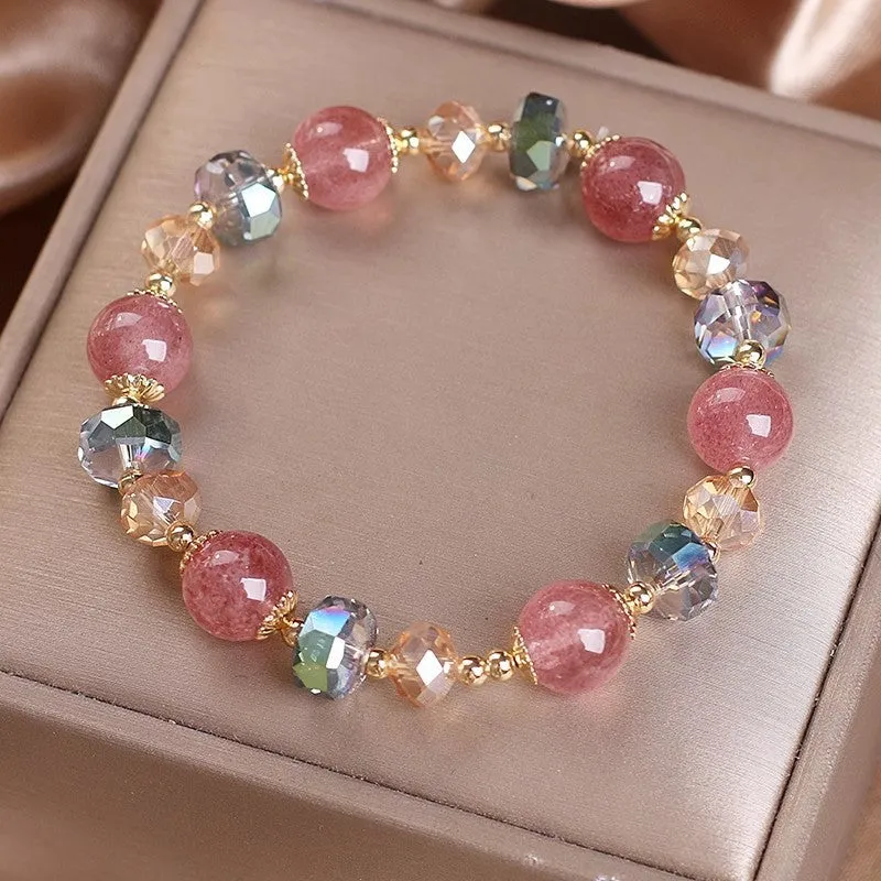 Women's double circle crystal bracelet with flower-shaped crystal detail in Strawberry Quartz colour