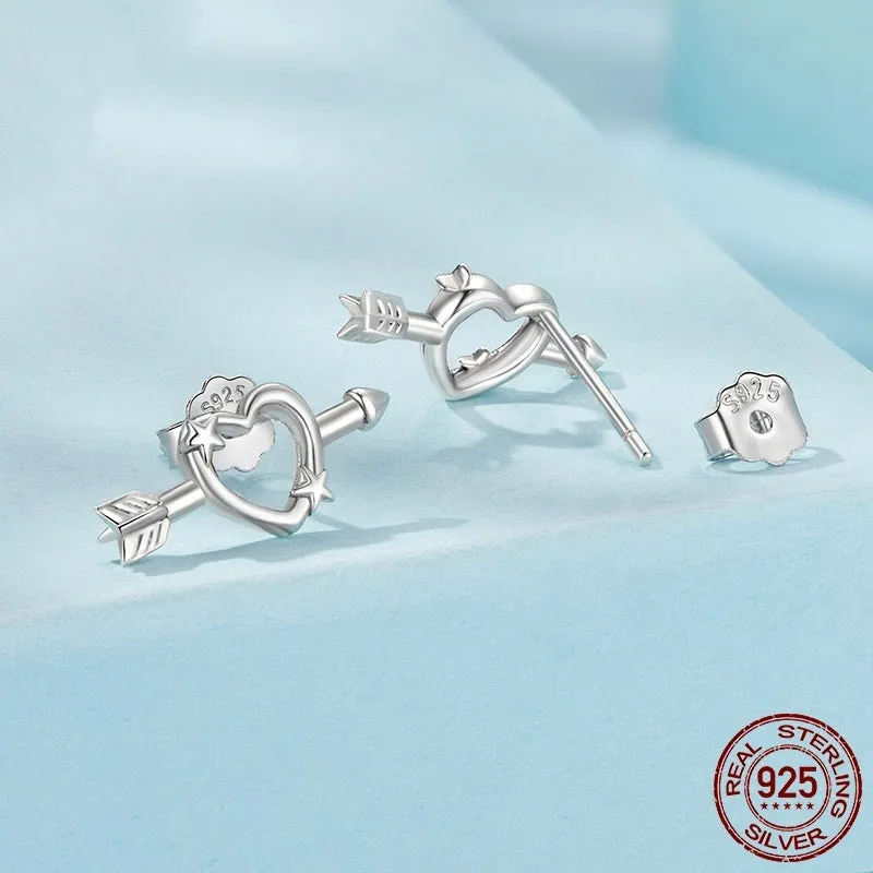 S925 sterling silver mini heart stud earrings with polished finish on white background