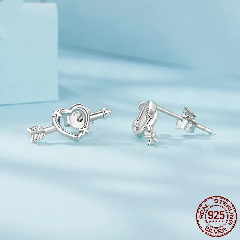 S925 sterling silver mini heart stud earrings with polished finish on white background