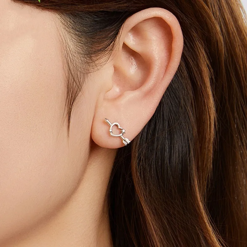 S925 sterling silver mini heart stud earrings with polished finish on white background