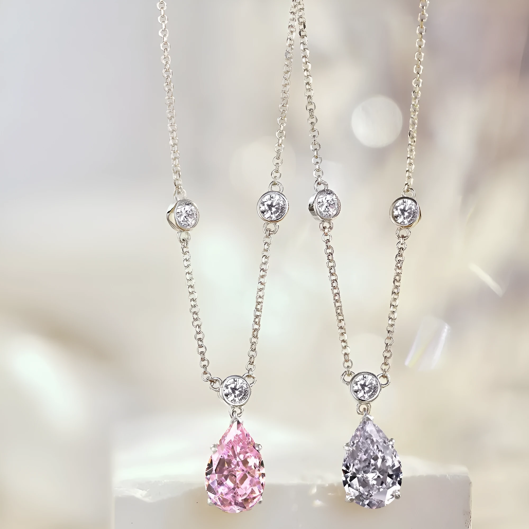 925 silver drop-shaped necklace with electroplated platinum white diamond finish on display